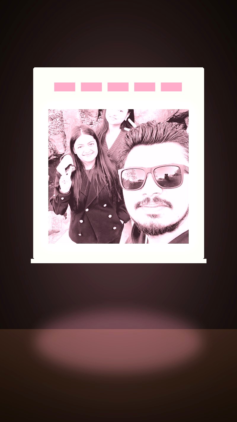 Lithophane of three people by a garden waterfall