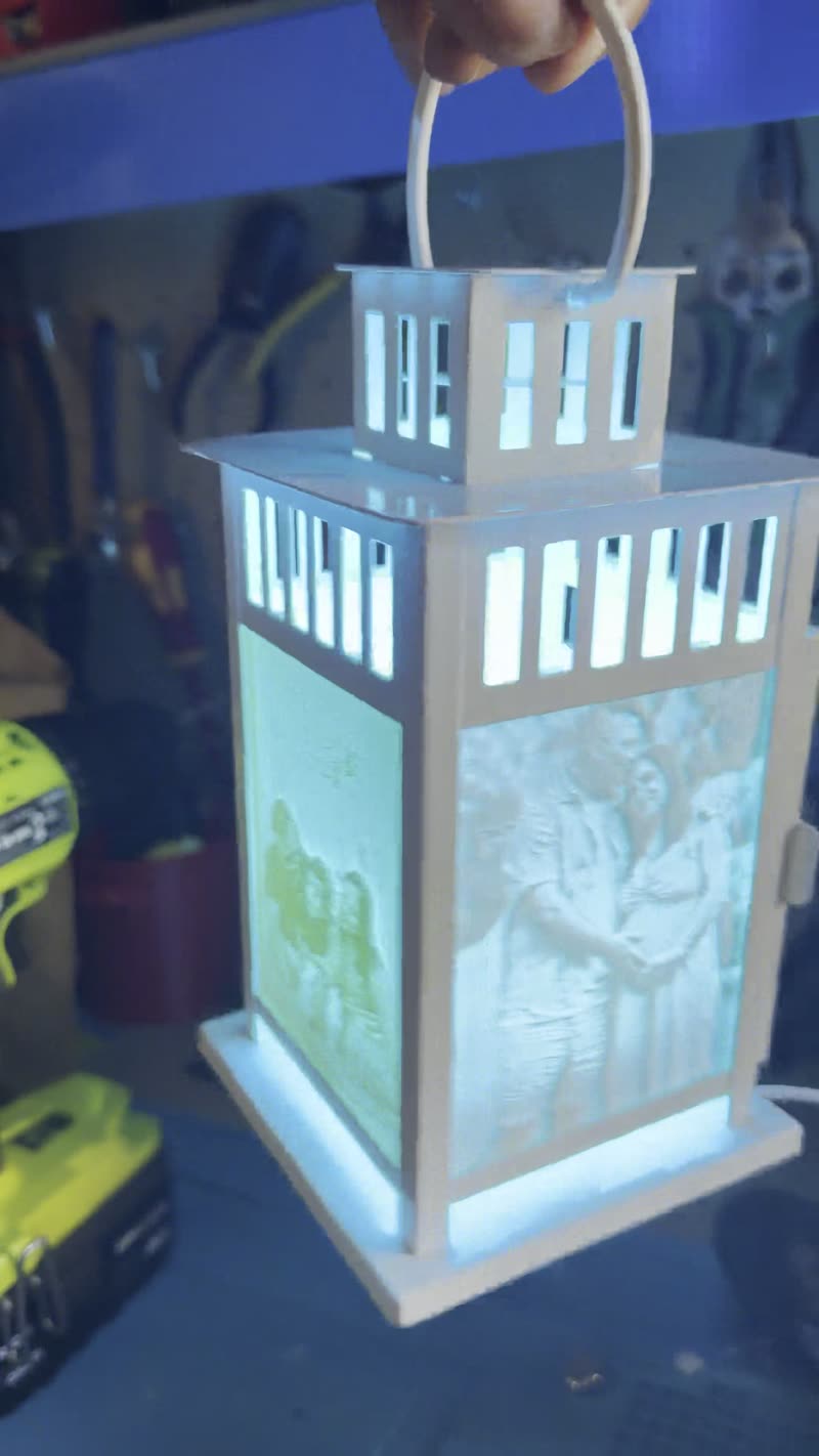 White lantern, couple holding hands